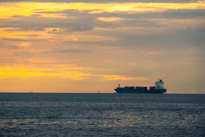 Scenic view of sea against sky during sunset