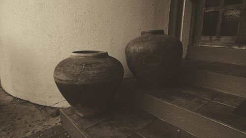 View of jar on table against wall