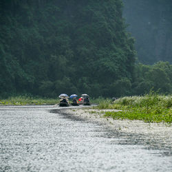 Cars on street against mountain