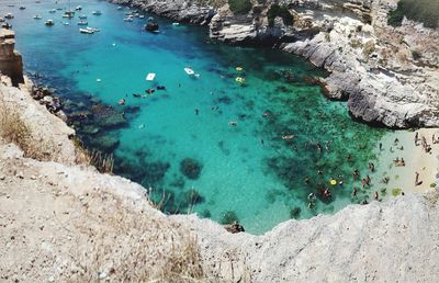 High angle view of rocks in sea