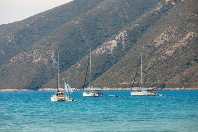 Scenic view of sea against mountain