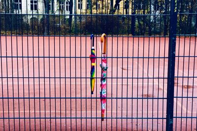 Full frame shot of multi colored fence against wall