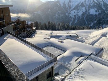 Scenic view of snow covered mountains