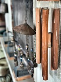 Close-up of lighting equipment hanging against wall