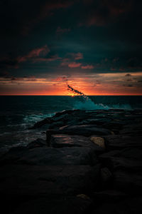 Scenic view of sea against sky during sunset