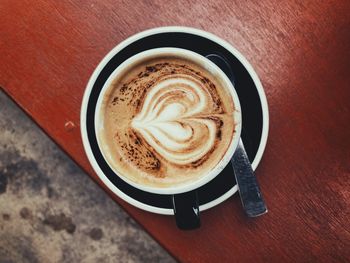 High angle view of cappuccino on table