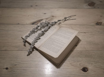 High angle view of book on table