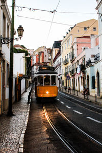 View of cable car on lisbon city street