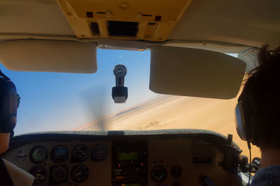 Low angle view of airplane flying in sky