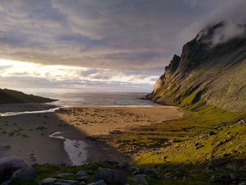 Scenic view of beach against sky during sunset