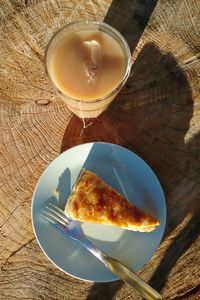 High angle view of cake and coffee on table