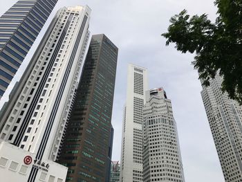 Low angle view of skyscrapers against sky