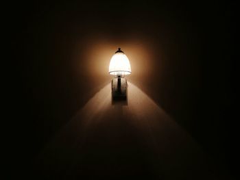 Illuminated lamp in dark room