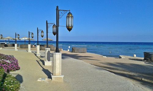 View of empty beach against clear sky