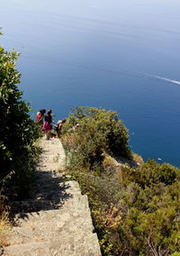 High angle view of people by sea