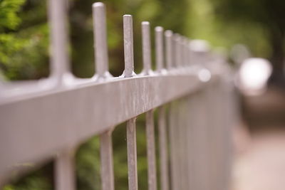 Close-up of fence against blurred background