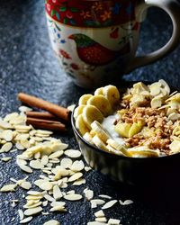 Fruits with cereal and flaked almonds for breakfast