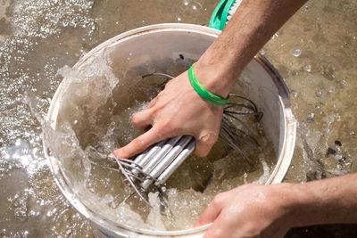 High angle view of man working in water