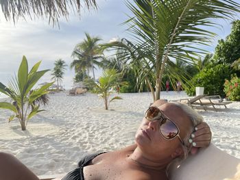 Man wearing sunglasses at beach