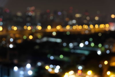 Defocused image of illuminated lights at night