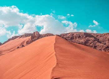 Panoramic view of desert against sky