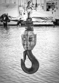 Close-up of boat moored at harbor