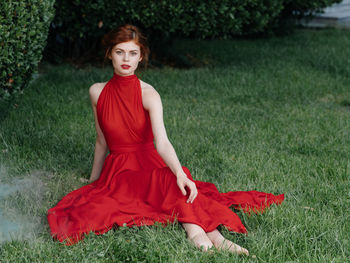 Portrait of young woman in field