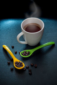 High angle view of coffee cup on table