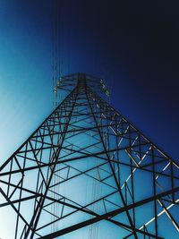 Low angle view of communications tower against clear sky