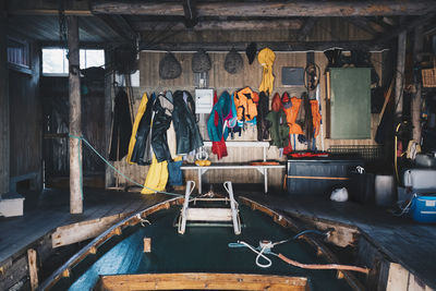 Empty boat and hanging clothes at holiday villa