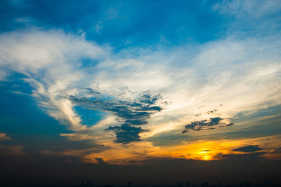 Low angle view of cloudy sky during sunset