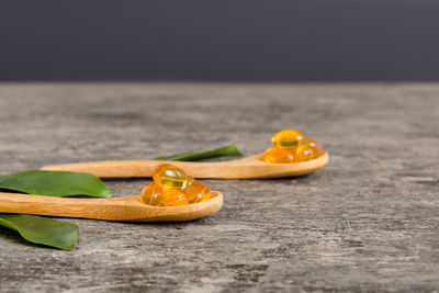 Close-up of red chili peppers on table