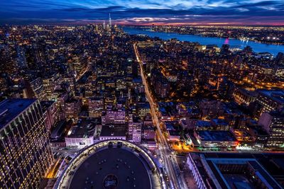 High angle view of illuminated city at night