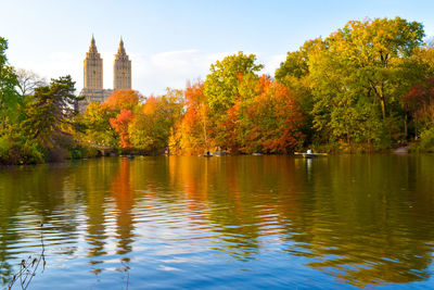 Scenic view of trees by lake during autumn