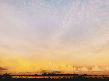 Scenic view of landscape against sky during sunset