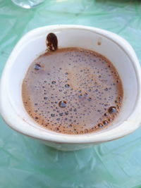 High angle view of coffee on table