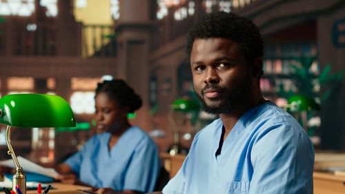 Side view of young man looking away