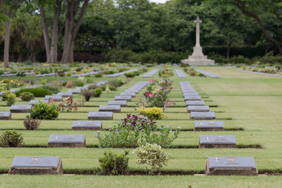 View of cemetery against cloudy sky