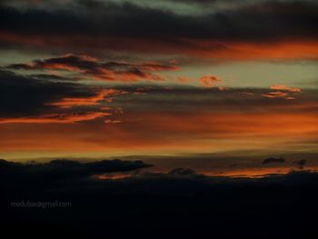 Scenic view of dramatic sky during sunset