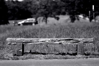 Wooden fence on grassy field