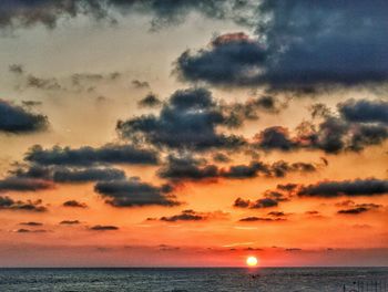 Scenic view of dramatic sky over sea