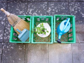High angle view of garbage bin on tiled floor