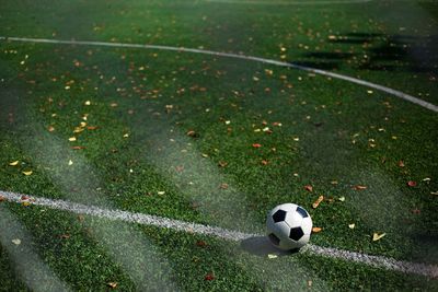 High angle view of soccer ball on field