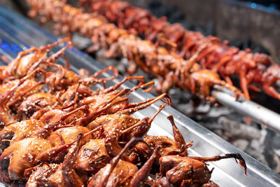 High angle view of meat on barbecue grill