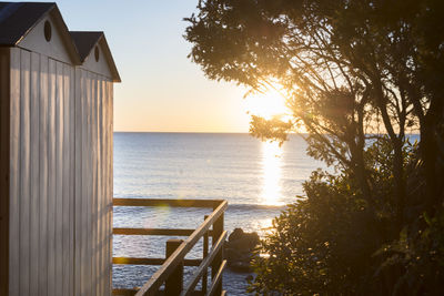 Scenic view of sea against sky at sunset