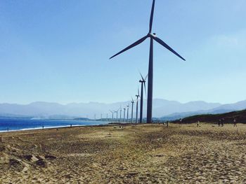 Windmills on landscape