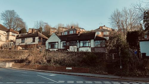 Houses and buildings against sky