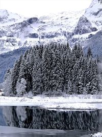 Scenic view of frozen lake against mountain