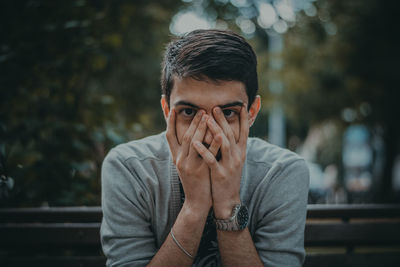 Portrait of shocked young man