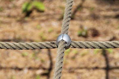 Close-up of rusty metal chain on playground